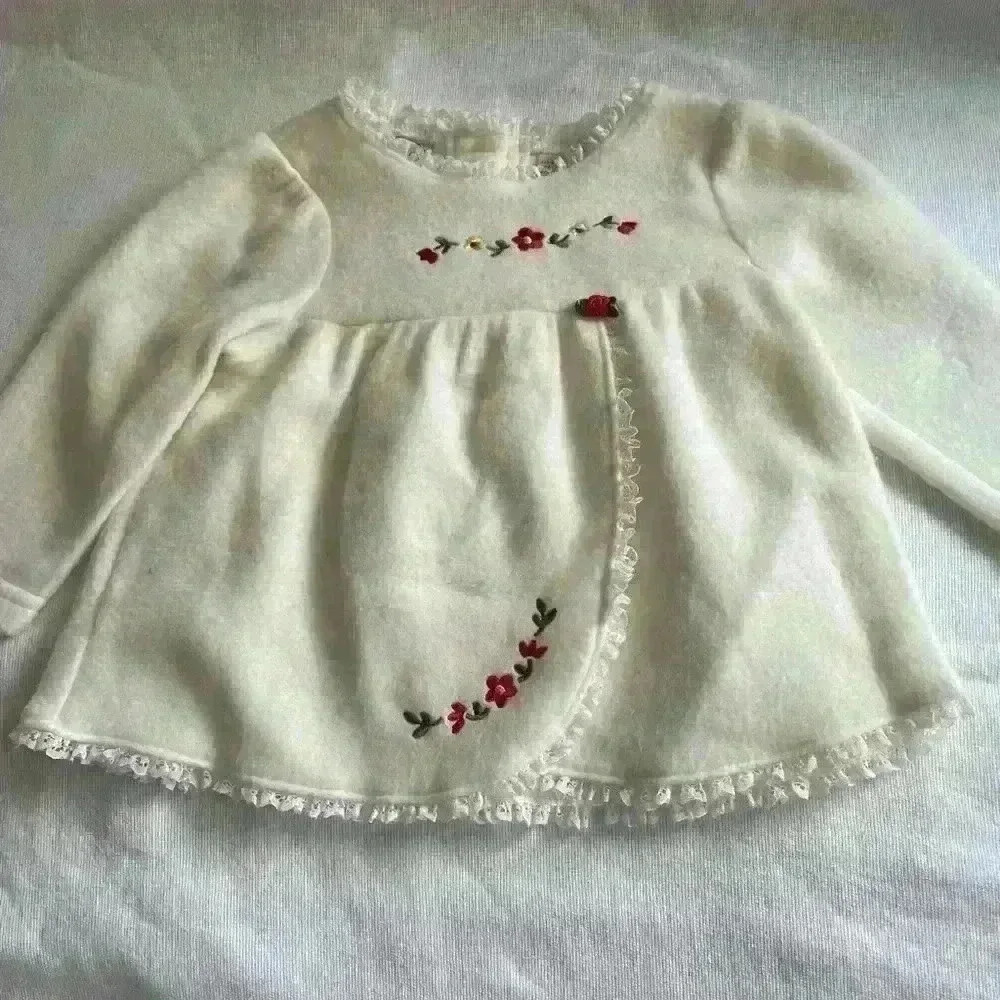 Little Lindsey Off-White top with embroidered red flowers, button back lace trim